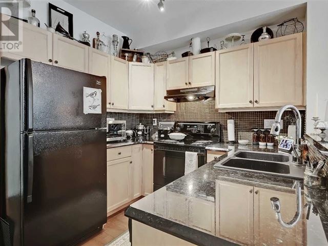 1000 15 AVE SW - 102 1000 15 Avenue Southwest - photo 2