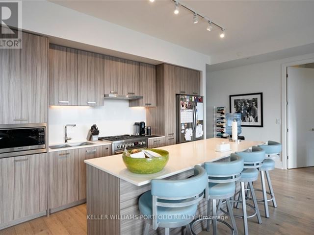 George Condos & Towns - 802 1331 Queen Street East - photo 3