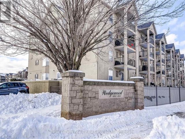 Wedgewood Condominiums 2 - 411 1431 Walkers Line - photo 1