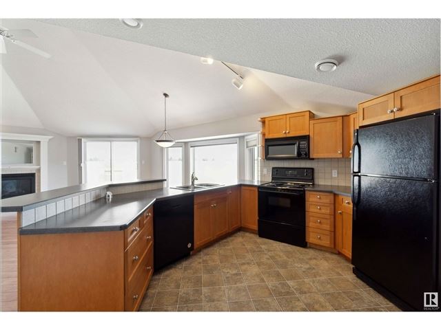 15499 Castle Downs RD NW - 409 15499 Castle Downs Road Northwest - photo 1