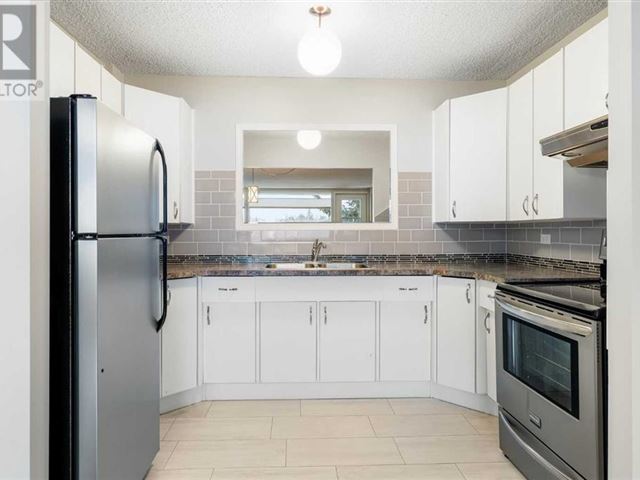 Cedarbrae Gardens - 428 1616 8 Avenue Northwest - photo 3