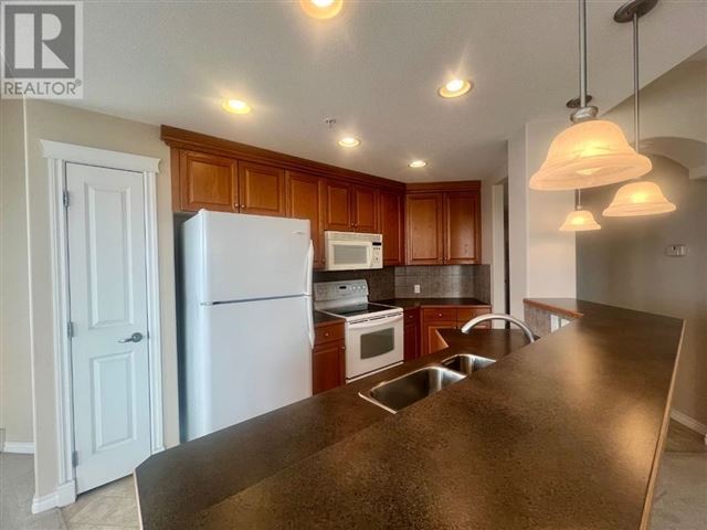 1726 14 Av Nw - 302 1726 14 Avenue Northwest - photo 2