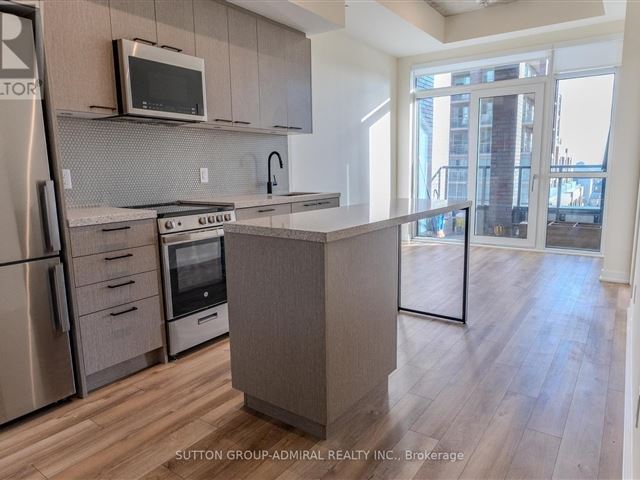 Reunion Crossing Condos & Urban Towns - 613 1808 Saint Clair Avenue West - photo 1