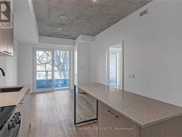 Reunion Crossing Condos & Urban Towns - 218 1808 Saint Clair Avenue West - photo 1