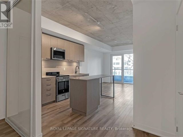 Reunion Crossing Condos & Urban Towns - 218 1808 Saint Clair Avenue West - photo 2