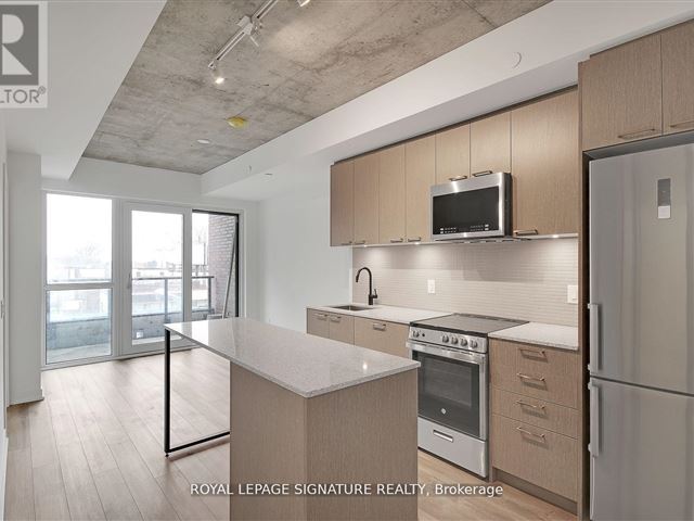 Reunion Crossing Condos & Urban Towns - 310 1808 Saint Clair Avenue West - photo 1