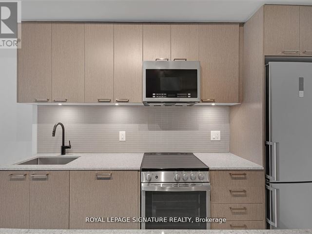 Reunion Crossing Condos & Urban Towns - 310 1808 Saint Clair Avenue West - photo 2