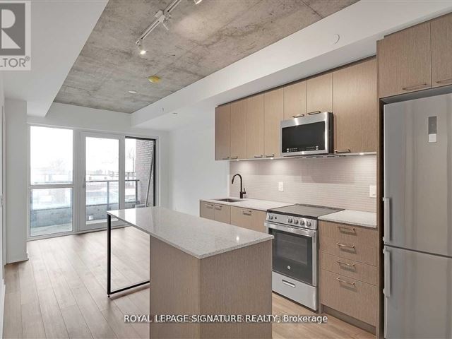 Reunion Crossing Condos & Urban Towns - 216 1808 Saint Clair Avenue West - photo 1