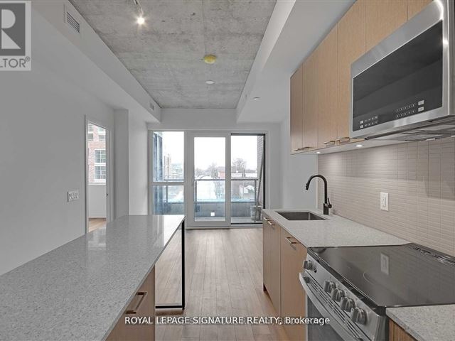 Reunion Crossing Condos & Urban Towns - 216 1808 Saint Clair Avenue West - photo 2