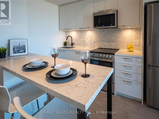 Reunion Crossing Condos & Urban Towns - 1011 1808 Saint Clair Avenue West - photo 1