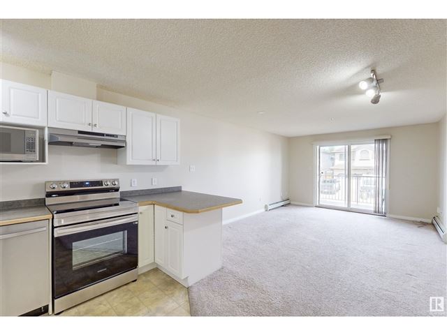 2305 35a AVE NW - 211 2305 35a Avenue Northwest - photo 1