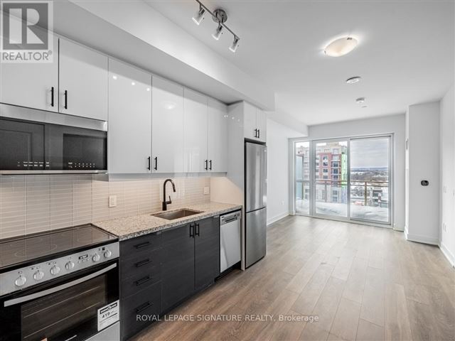 Nuvo Condos - 842 2343 Khalsa Gate - photo 2