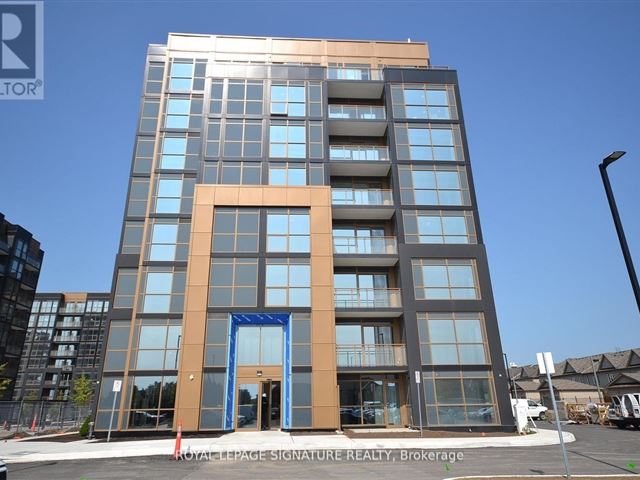 Nuvo Condos - 116 2343 Khalsa Gate - photo 1