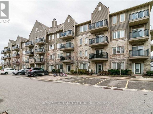 3055 Thomas Condos - 411 5610 Winston Churchill Boulevard - photo 1