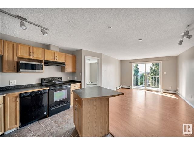 3425 19 ST NW - 303 3425 19 Street Northwest - photo 2