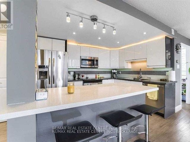 Place Royale Condo - 608 3695 Kaneff Crescent - photo 1