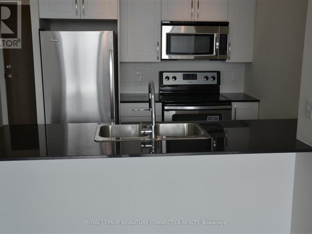 The Residences at Parkside Village - 2105 4065 Brickstone Mews - photo 2