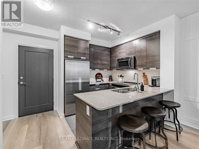 Amber Condos - 606 5033 Four Springs Avenue - photo 2