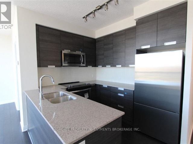 Amber Condos - 717 5033 Four Springs Avenue - photo 2