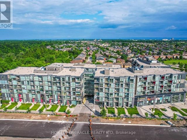 Link Condos and Towns - a527 5230 Dundas Street - photo 2