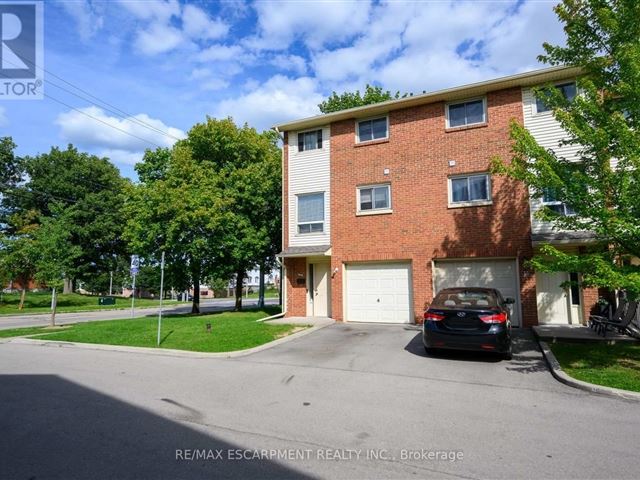 6 Loconder Condos - 12 346 Rexford Drive - photo 1