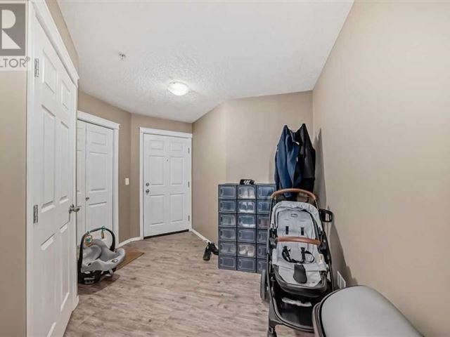 6315 Ranchview Dr Nw - 213 6315 Ranchview Drive Northwest - photo 2