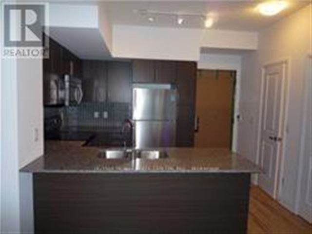 Rain Condos - 407 65 Speers Road - photo 2