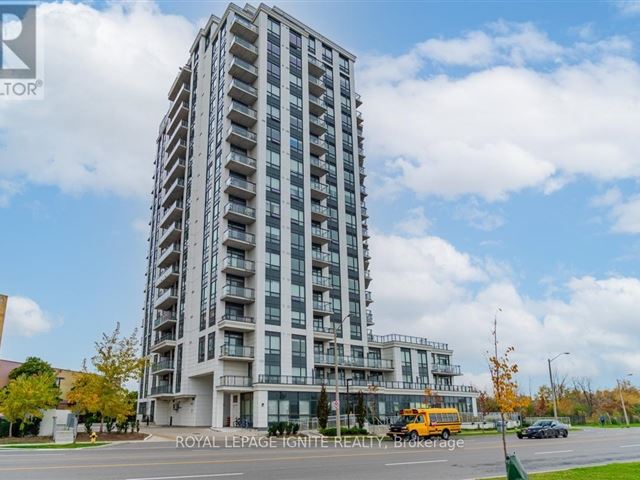 The Lexington Condominium Residences by the Park - 806 840 Queens Plate Drive - photo 1