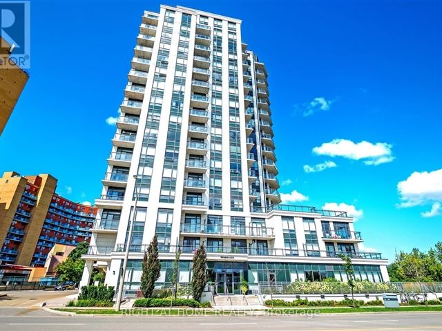 The Lexington Condominium Residences by the Park - 201 840 Queens Plate Drive - photo 1