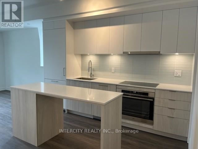 Monza Condos - 304 863 Saint Clair Avenue West - photo 1