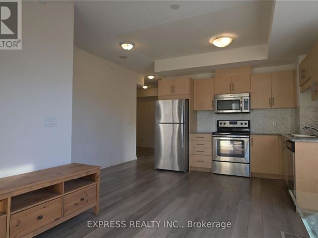 UV2 Condos - 208 9506 Markham Road - photo 1